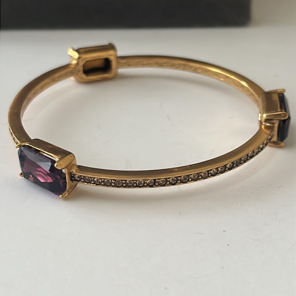 Oscar de la Renta Gold Tone Bangle Bracelet with Bezel and Purple Stones